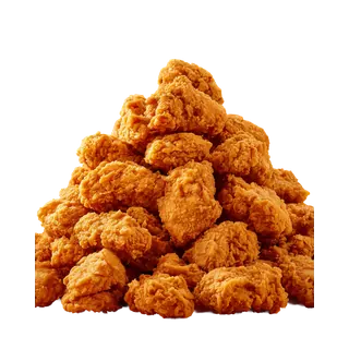 A large pile of golden-brown, crispy fried chicken nuggets stacked on a solid grey background.